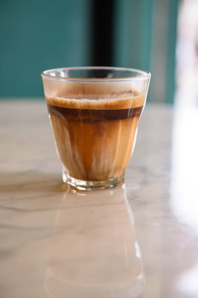 istock Cup of latte on marble table 1158630771