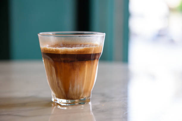 istock Cup of latte on marble table 1158630813