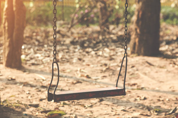 istock Children swing,playground in the park 1158631134