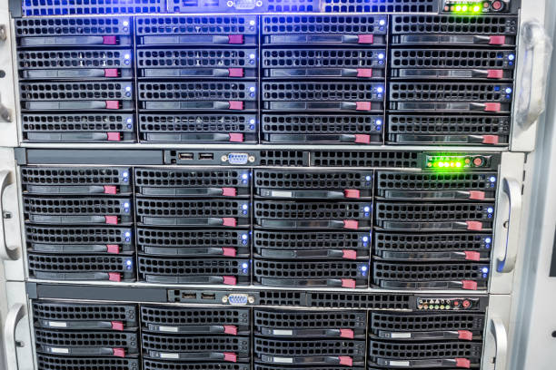 istock Computer hardware is on hosting site of the Internet provider. Access server is a close-up. Cloud storage concept. Mining farm cryptocurrency. Modern communication equipment is in the server room. 1158632387