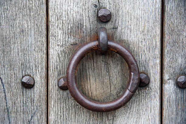 istock Knocker of a roman house 115863292