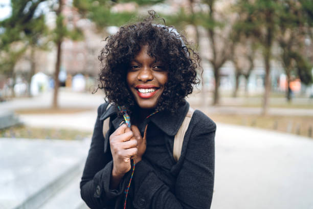 istock Young woman on town square 1158634046
