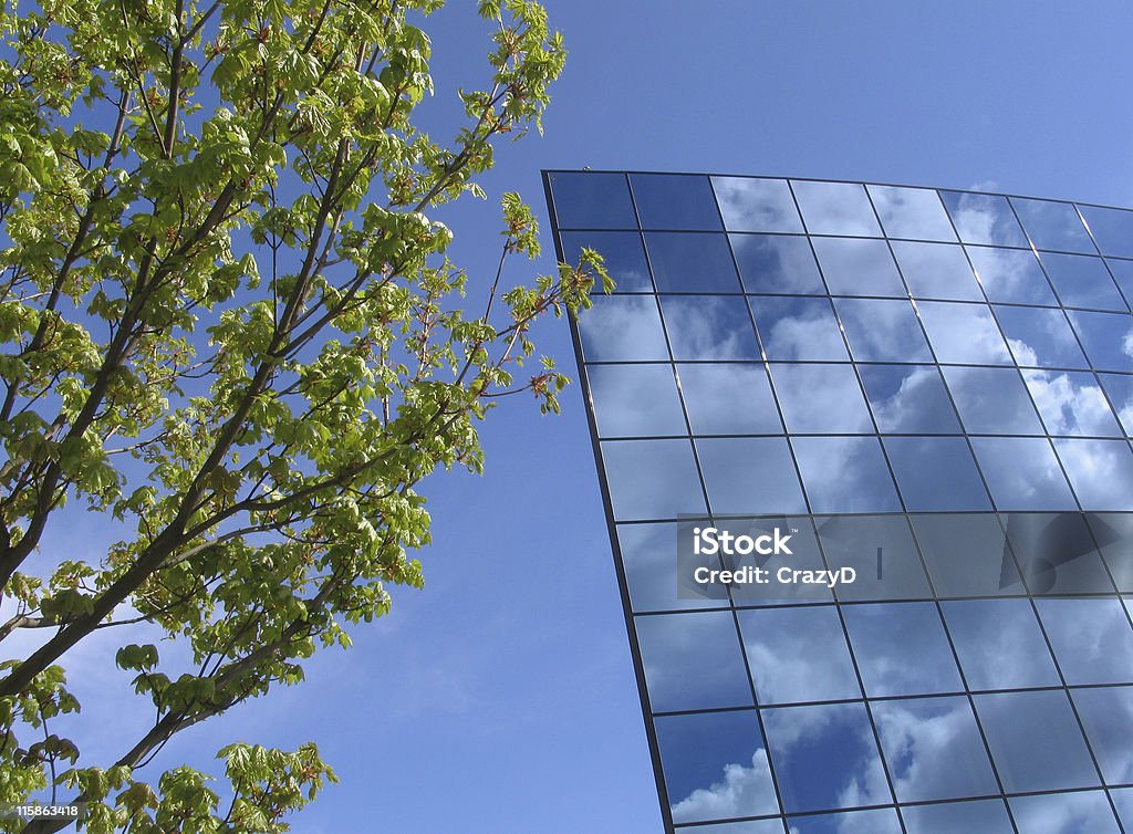 Corporate building at springtime #2 With nice cloud reflections in the glass. Abstract Stock Photo