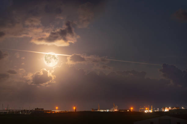 Germany, Lower Saxony, East Frisia, Juist, Full Moon [M]. Full moon night over the harbour. Germany, Lower Saxony, East Frisia, Juist, Full Moon [M]. Full moon night over the harbor. mondlicht stock pictures, royalty-free photos & images