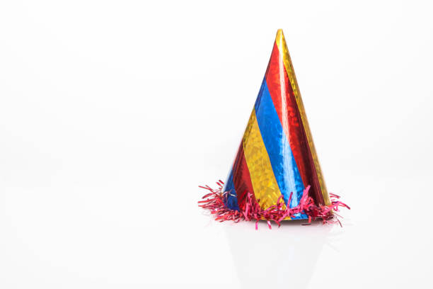 Party Hat Party hat on white background confetti star shape red yellow stock pictures, royalty-free photos & images