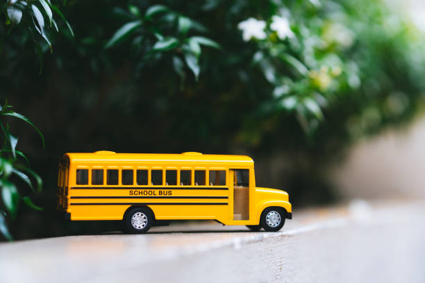 istock Miniature of yellow school bus 1158635599