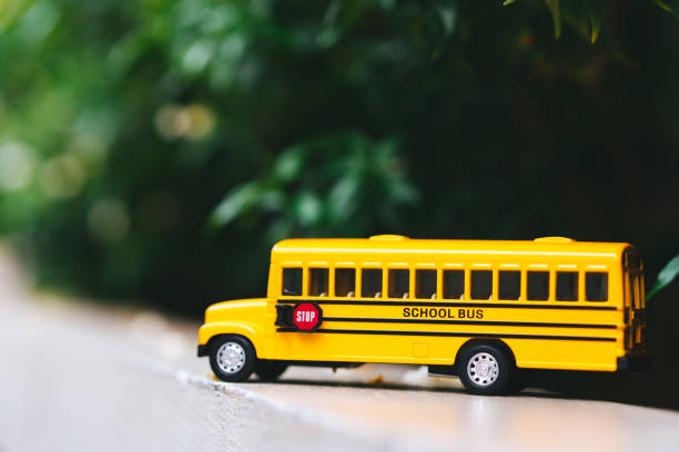 istock Miniature of yellow school bus 1158635627