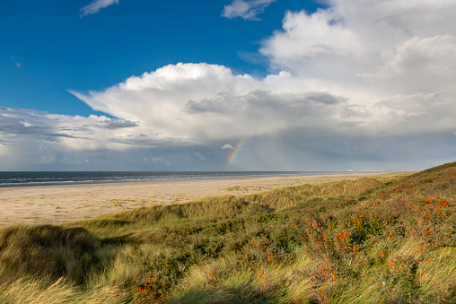 Germany, Lower Saxony, East Frisia, Juist, Rainbow over the North Sea.