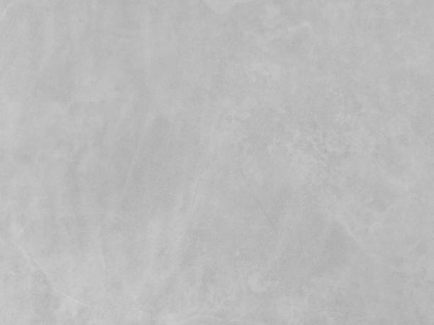 istock gray concrete background texture clean stucco fine grain cement wall clear and smooth white polished grunge interior indoor. 1158636955