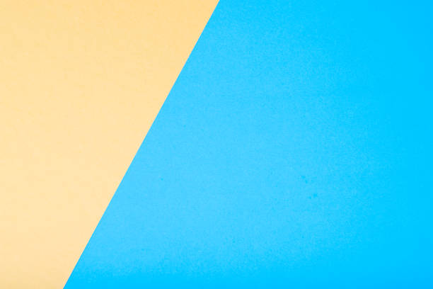 istock Yellow and green two tone color paper background. 1158643990