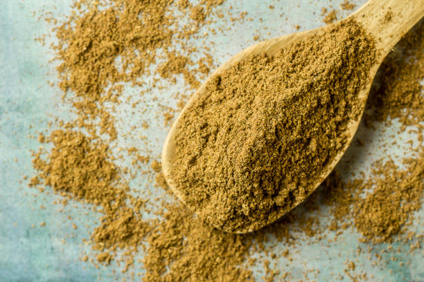 Garam Masala powder Garam Masala in a spoon cumin stock pictures, royalty-free photos & images