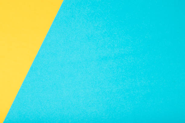 istock Yellow and green two tone color paper background. 1158647063