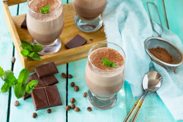 istock Homemade chocolate-nut mousse on the kitchen wooden background. 1158647603