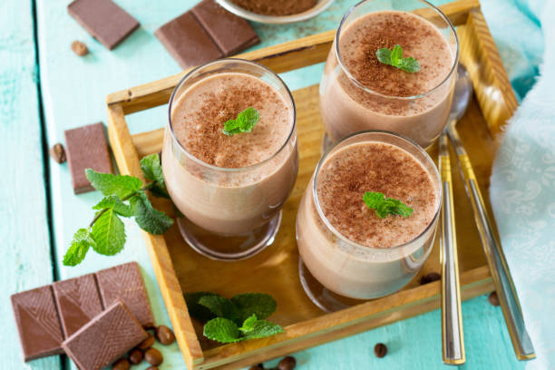 istock Homemade chocolate-nut mousse on the kitchen wooden background. 1158647631