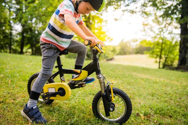 istock Content Boy on his first real bike with pedals 1158650908