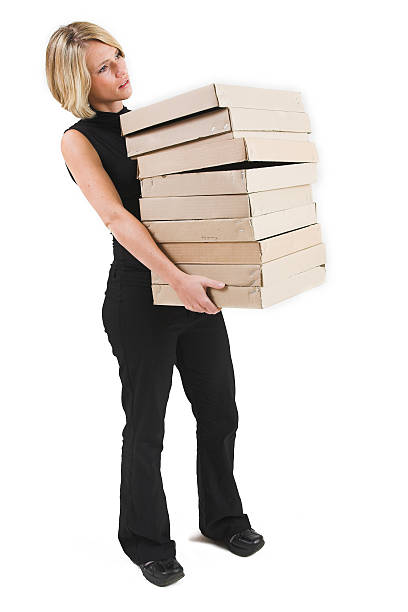 istock Businesswoman with boxes 115865304