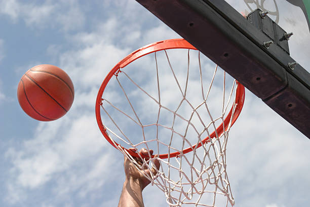 istock Basketball Going Into the Hoop 115866542