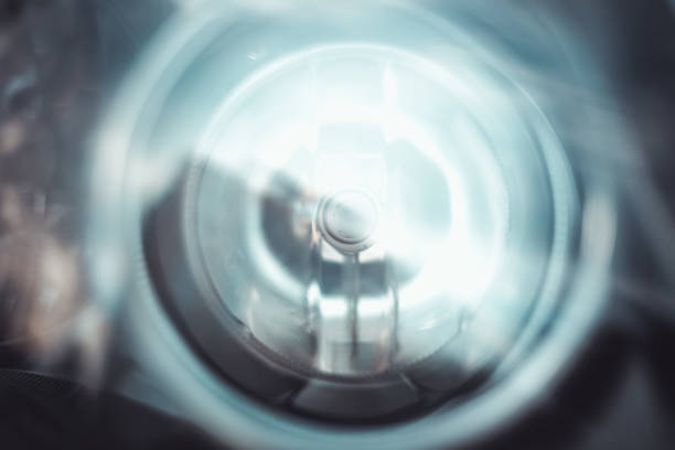 istock Detailed car headlights shot through glass 1158669701