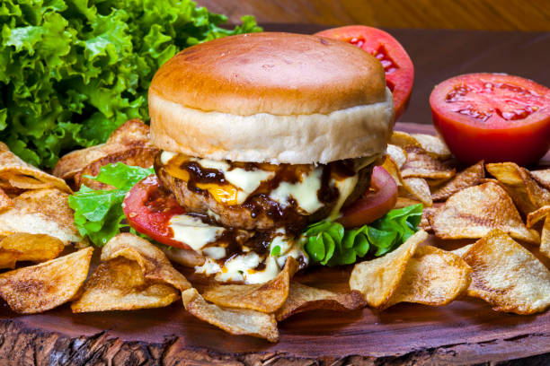 istock hamburger with fries 1158671369