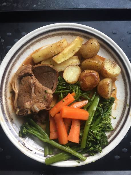 istock A Pork Chop Roasted Sunday Dinner 1158673327