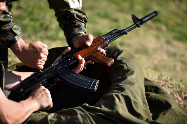 istock Outdoor target shooting with assault rifle in a shooting range 1158674379