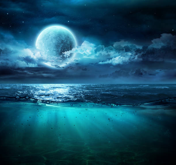Moon On Sea In Magic Night With Underwater Scene Moon On Sea In Magic Night With Underwater Scene planetary moon photos stock pictures, royalty-free photos & images