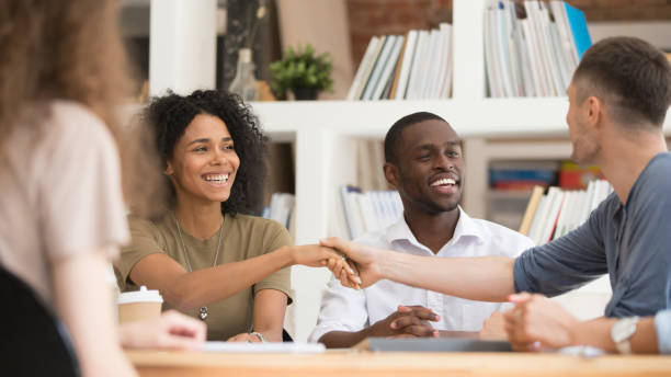 istock Smiling diverse people handshake getting acquainted at meeting 1158676639