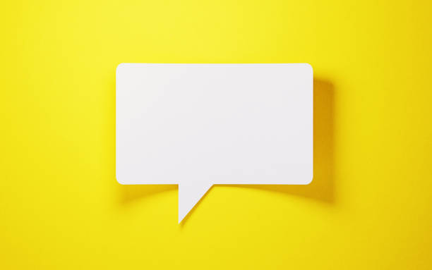 White speech bubble shaped post it note on yellow background. Horizontal composition with copy space.