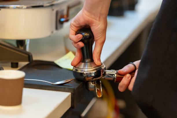 istock barista making coffee with coffee machine. 1158684069