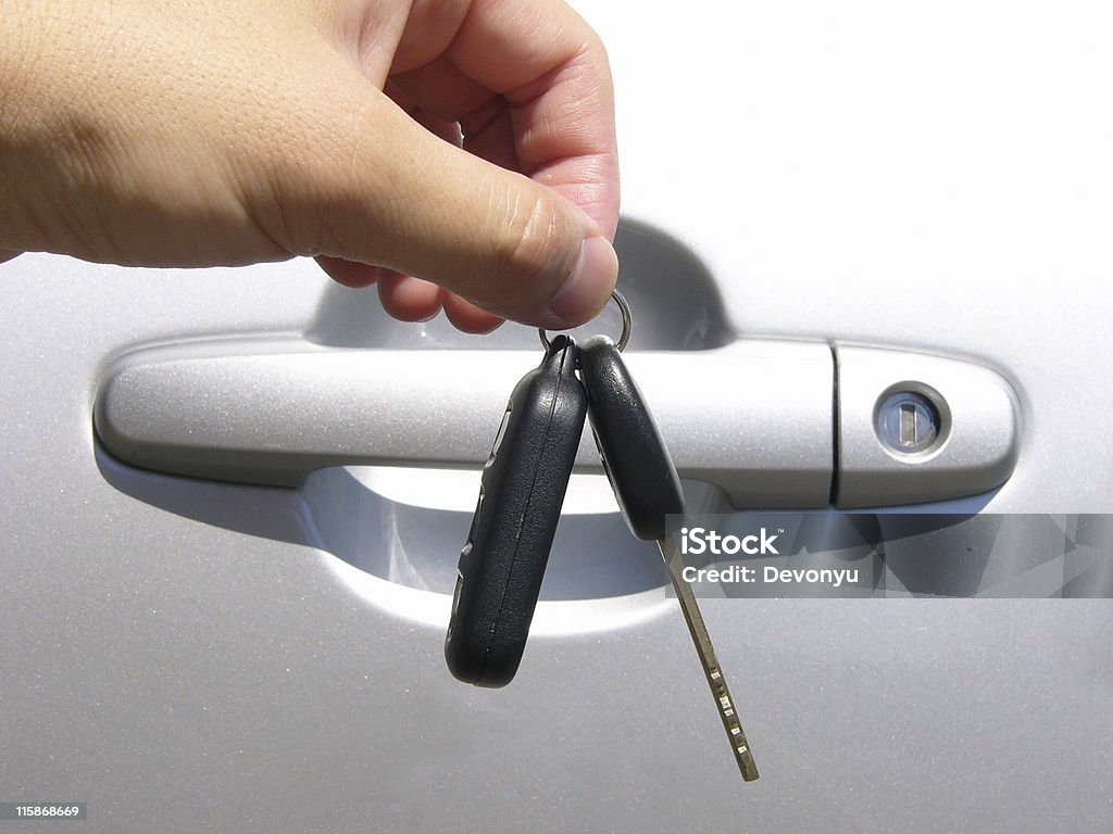 hand and car key  Beginnings Stock Photo