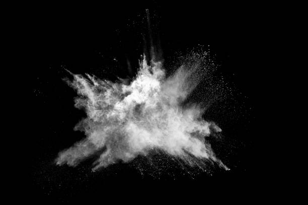 istock White powder explosion on black background. Colored cloud. Colorful dust explode. Paint Holi. 1158688765