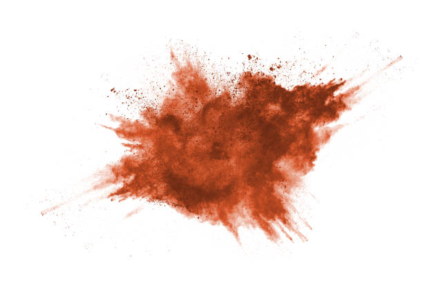 istock Brown color powder explosion on white background. Colored cloud. Colorful dust explode. Paint Holi. 1158688802