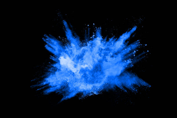 istock abstract blue powder splatted background,Freeze motion of color powder exploding/throwing color powder,color glitter texture on black background. 1158688805