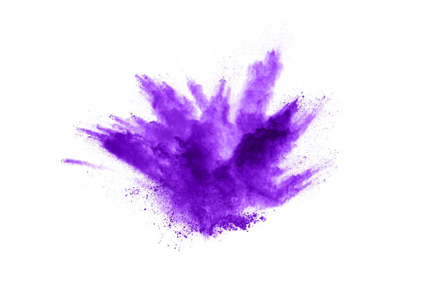 istock Powder explosion. Closeup of a purple dust particle explosion isolated on white. Abstract background. 1158688841