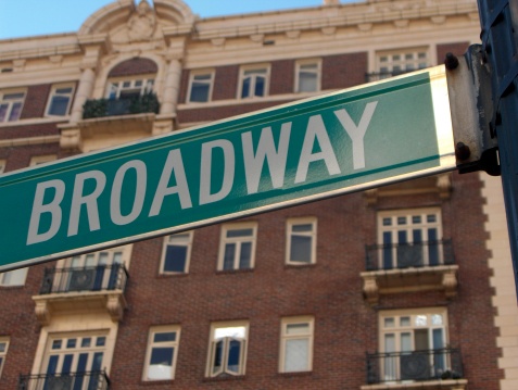 Green street sign, indicating Broadway. The photo was taken in Portland, but could double for Broadway anywhere, I suppose.