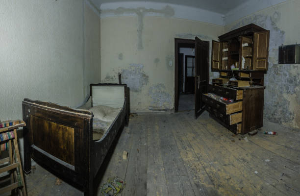 istock bed and box in room panorama 1158690571