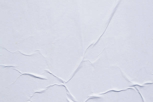 istock White creased poster texture. Abstract background. 1158691637