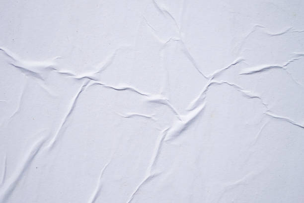 istock White creased poster texture. Abstract background. 1158691674