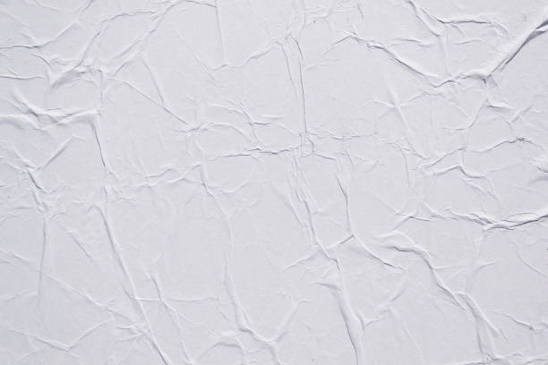istock White creased poster texture. Abstract background. 1158692353