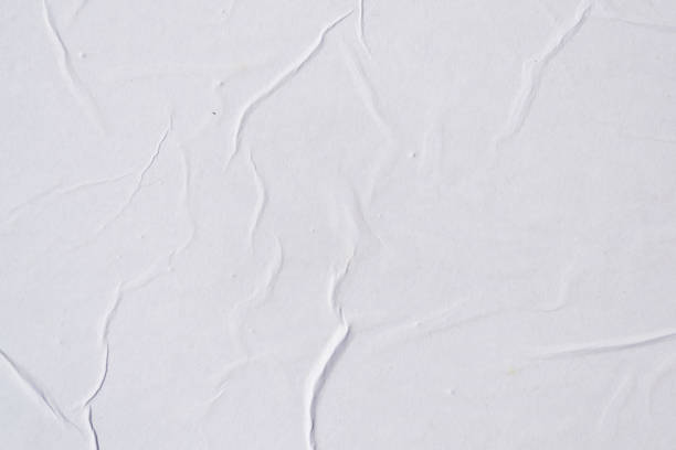 istock White creased poster texture. Abstract background. 1158692354