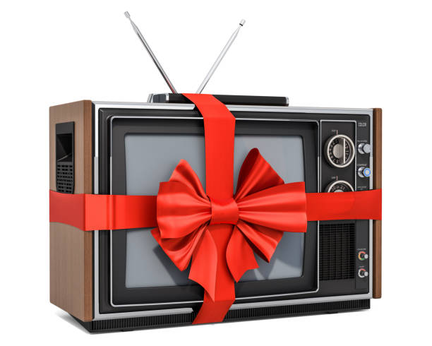 istock Gift concept, TV set with red ribbon and bow. 3D rendering isolated on white background 1158694320