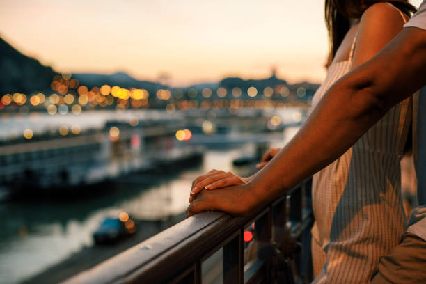 Tourist couple enjoying the view over the city of Budapest.