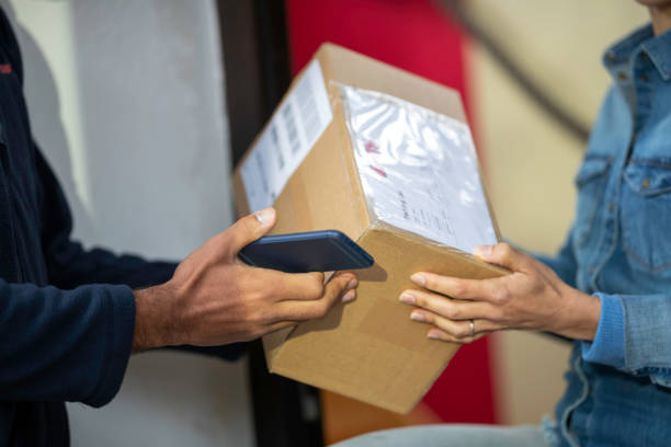 istock Home delivery of a box to the client 1158696207