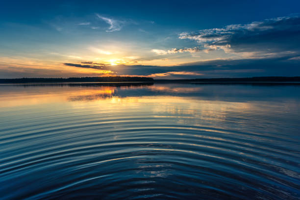 istock Panoramic shot of sunrise over lake 1158696311