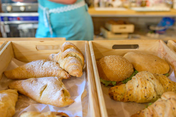 istock Croissants on a basket weave in a bakery shop. 1158699804