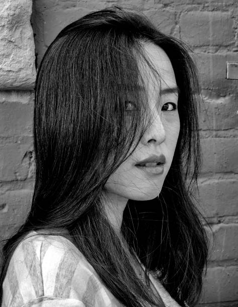 istock Monochrome profile of a young woman's face 1158699860
