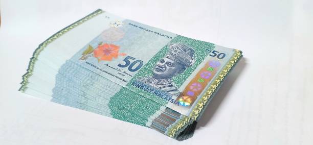 pila di soldi malaysia ringgit - malaysian ringgit foto e immagini stock