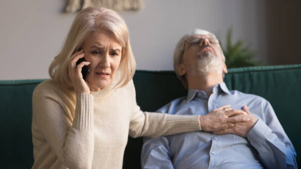 istock Wife makes emergency call while husband lies with heart attack 1158702121
