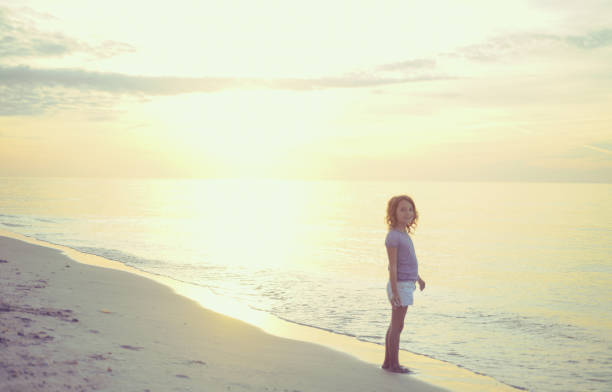 istock Girl at the beach 1158703328