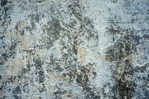 istock Close-up of old wall with peeling paint surface. Grunge background. 1158706709